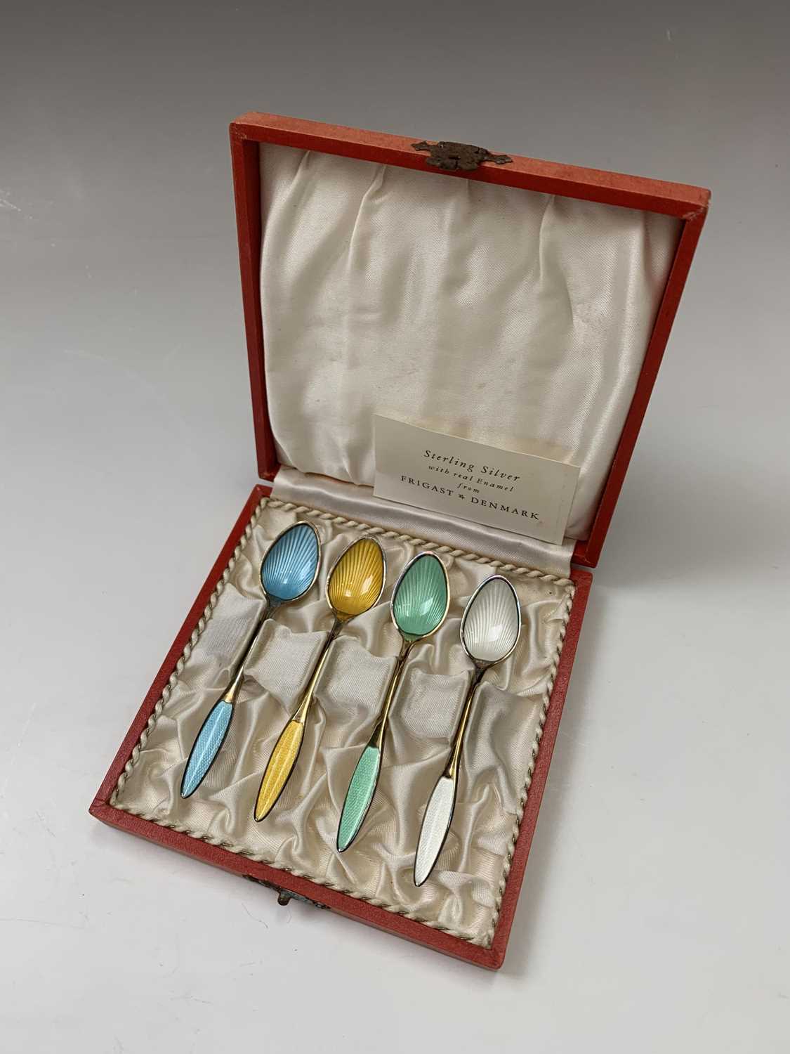 Lot 68 - A set of four Danish Frigast enamel spoons, cased