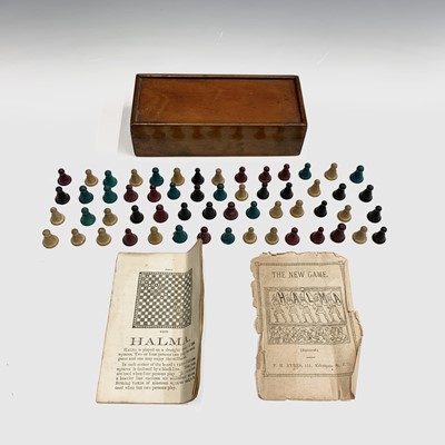 Lot 581 - 'Halma' games pieces, in a mahogany box af