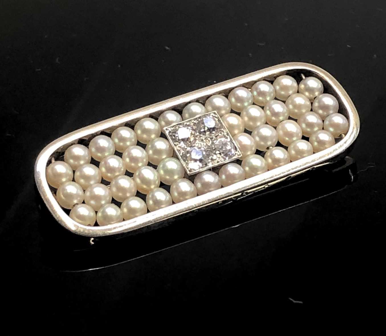 Lot 2551 - A 1920's white gold rounded rectangular
