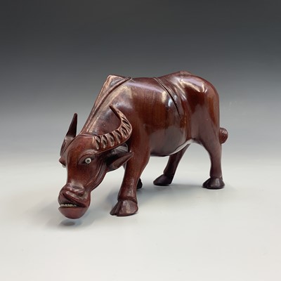 Lot 239 - A Chinese bronze sculpture of a buffalo,...