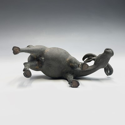 Lot 239 - A Chinese bronze sculpture of a buffalo,...