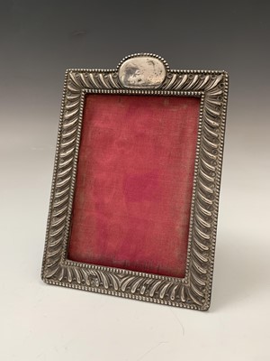 Lot 21 - A silver-mounted photograph frame with...