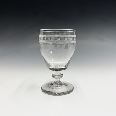 Lot 1106 - A 19th century glass rummer, the etched border...