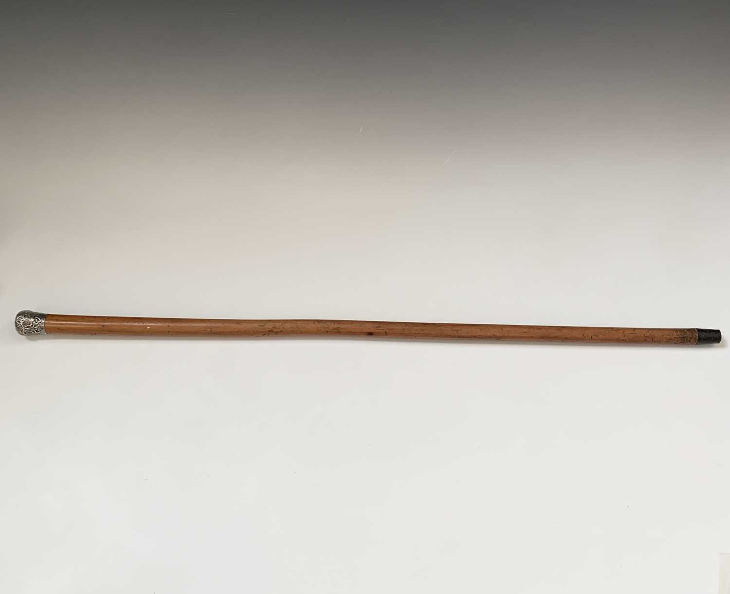 Lot 166 - A silver topped malacca walking cane, 19th...