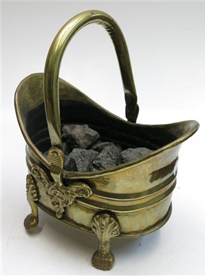 Lot 317 - A brass two-handled pan, together with a brass...