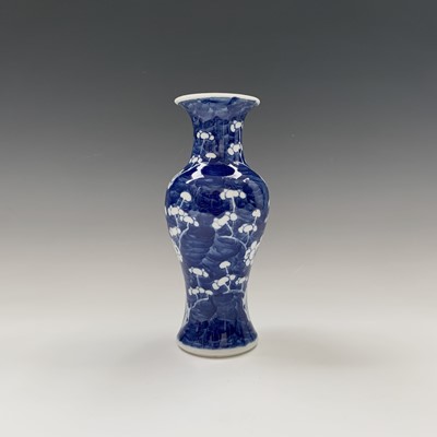 Lot 169 - A Chinese blue and white prunus pattern vase,...