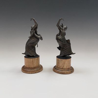 Lot 180 - A pair of Tibetan bronze figures of dancers,...