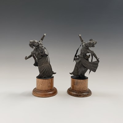 Lot 180 - A pair of Tibetan bronze figures of dancers,...