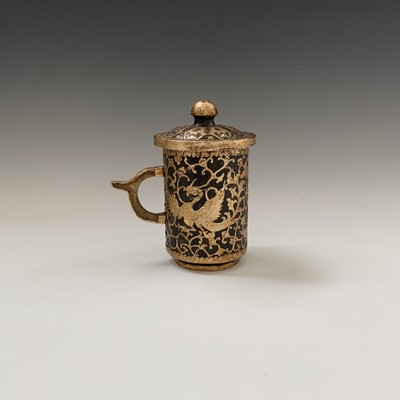 Lot 207 - A Tang style hardstone gilded tankard and...