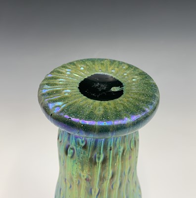 Lot 959 - A Loetz type iridescent green glass vase,...