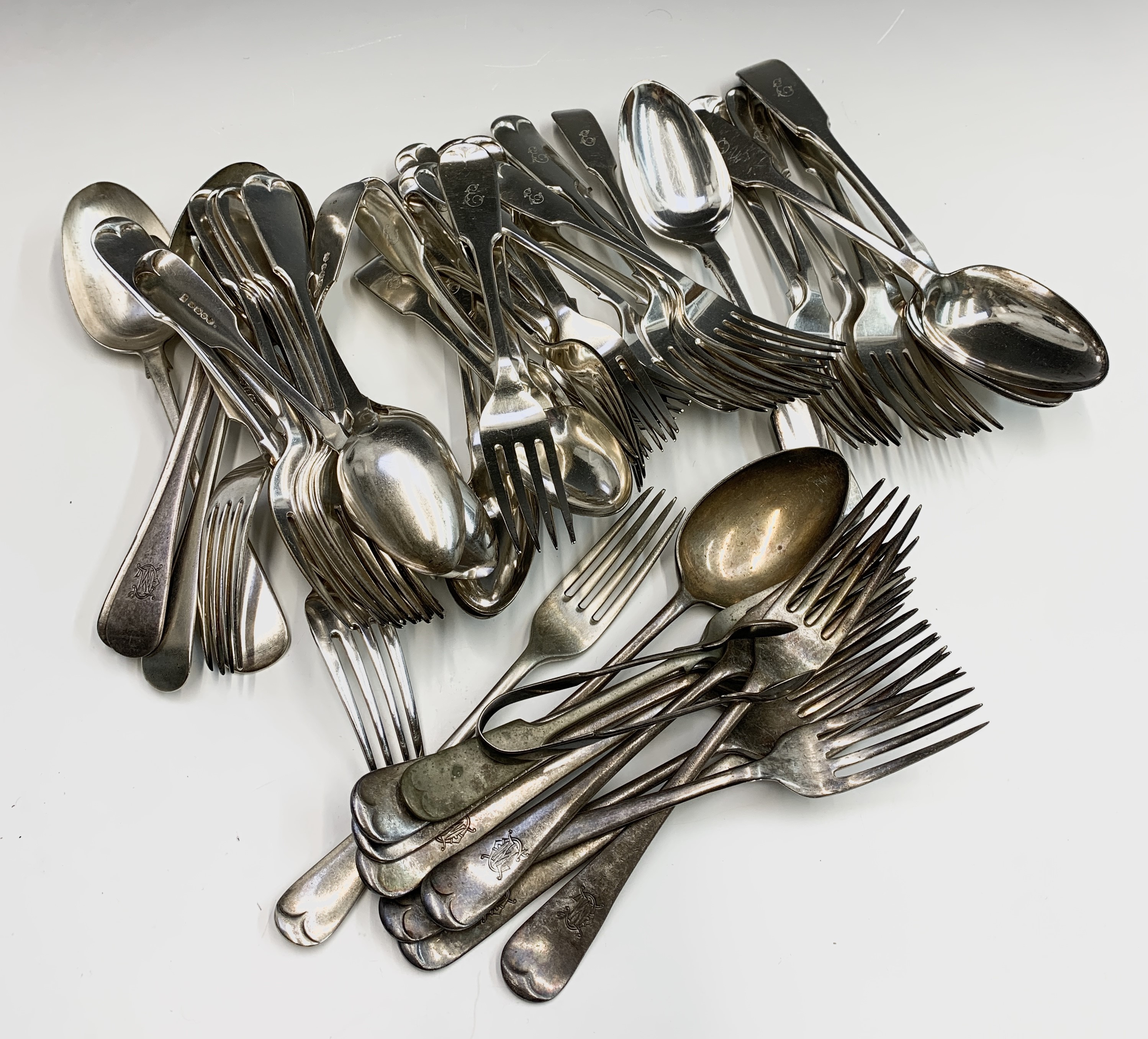 Lot 228 A collection of EPNS cutlery in both fiddle