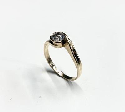 Lot 55 - An 18ct gold diamond solitaire contemporary...