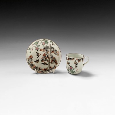 Lot 129 - A Japanese porcelain cup and saucer, Meiji...