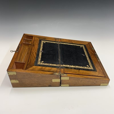 Lot 249 - A Victorian walnut and brass bound writing...