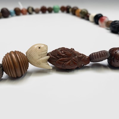 Lot 280 - A Japanese ojime bead necklace, length 39cm.