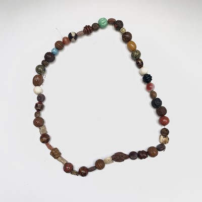 Lot 280 - A Japanese ojime bead necklace, length 39cm.