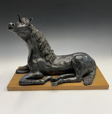 Lot 270 - A ceramic sculpture of a unicorn, modelled in...