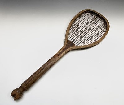 Lot 271 - An early 20th century fish tail tennis racquet,...