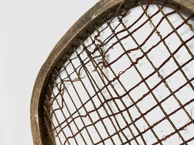 Lot 271 - An early 20th century fish tail tennis racquet,...