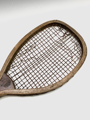 Lot 271 - An early 20th century fish tail tennis racquet,...