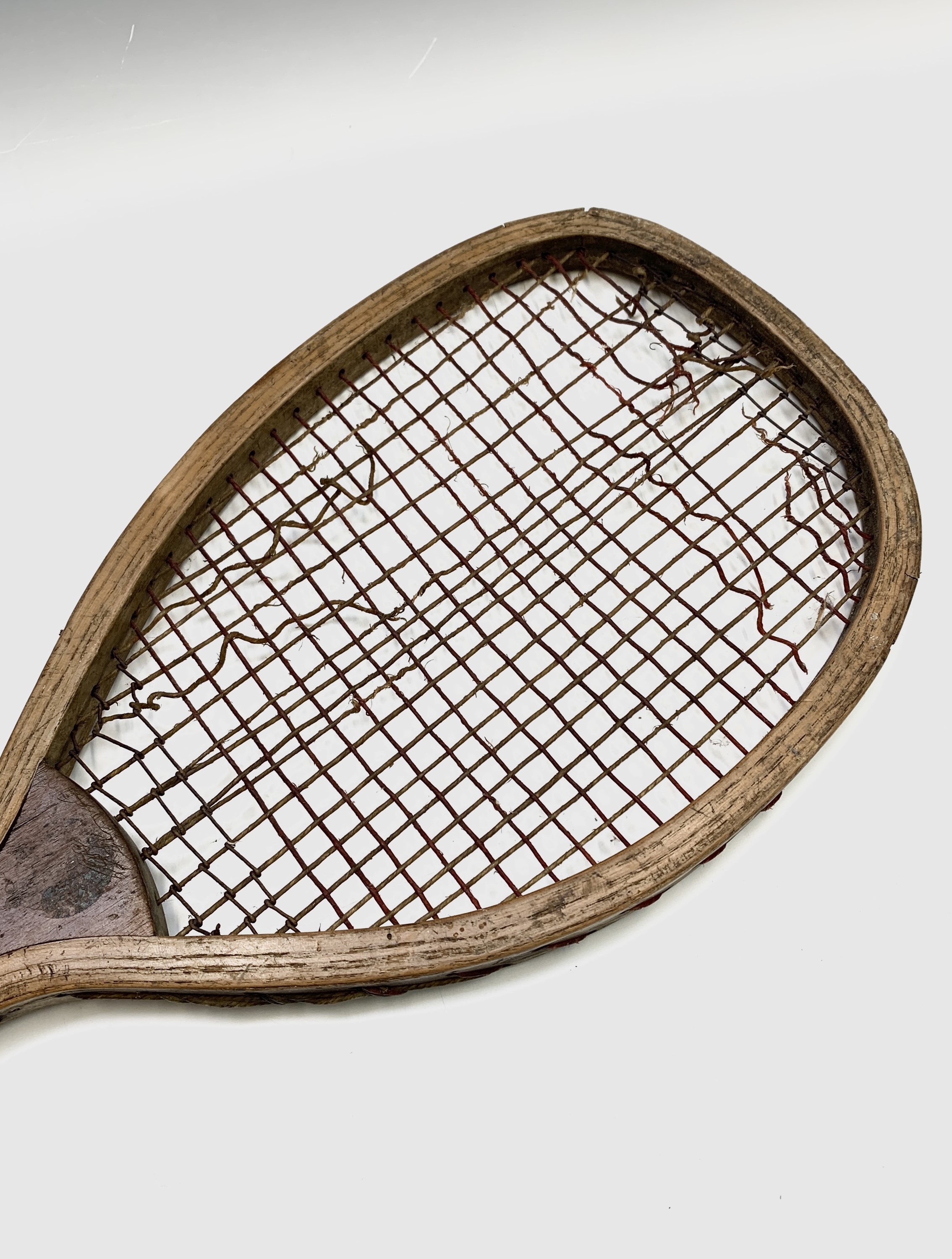 Lot 271 - An early 20th century fish tail tennis
