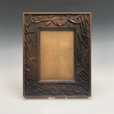 Lot 287 - A pair of Aesthetic movement oak picture or...