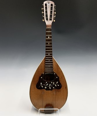 Lot 313 - An Indian eight string mandolin, labelled for...