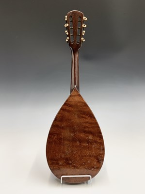 Lot 313 - An Indian eight string mandolin, labelled for...