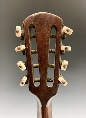 Lot 313 - An Indian eight string mandolin, labelled for...