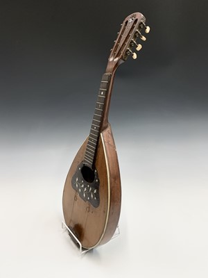 Lot 313 - An Indian eight string mandolin, labelled for...