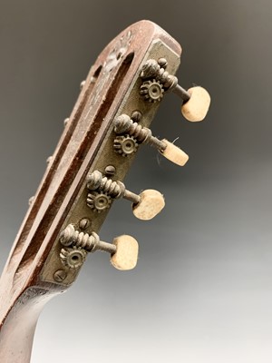 Lot 313 - An Indian eight string mandolin, labelled for...