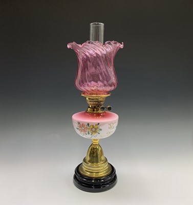 Lot 296 - A Victorian oil lamp, with floral painted pink...