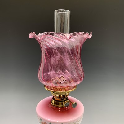 Lot 296 - A Victorian oil lamp, with floral painted pink...