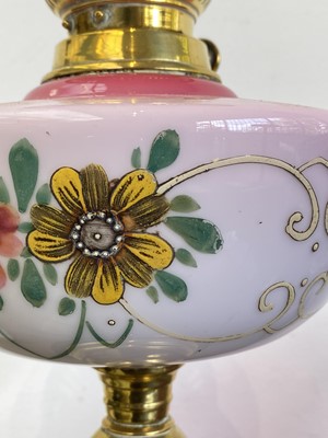 Lot 296 - A Victorian oil lamp, with floral painted pink...