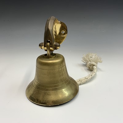 Lot 596 - A brass bell, height 14cm overall, a near pair...