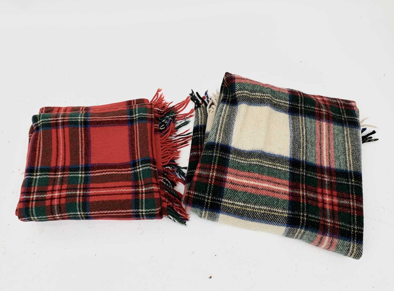 Lot 2851 - A New Conway tartan wool travel rug, 152 x...