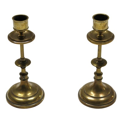 Lot 188 - A pair of 19th century brass candlesticks,...