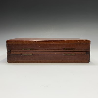 Lot 337 - A mahogany folding travel chess set, circa...