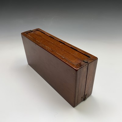 Lot 337 - A mahogany folding travel chess set, circa...