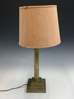 Lot 361 - A brass Corinthian column table lamp. Height...