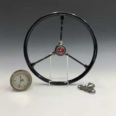 Lot 357 - A vintage three spoke car steering wheel, the...