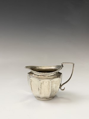Lot 133 - A silver Georgian style three-piece tea...