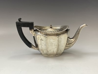 Lot 133 - A silver Georgian style three-piece tea...