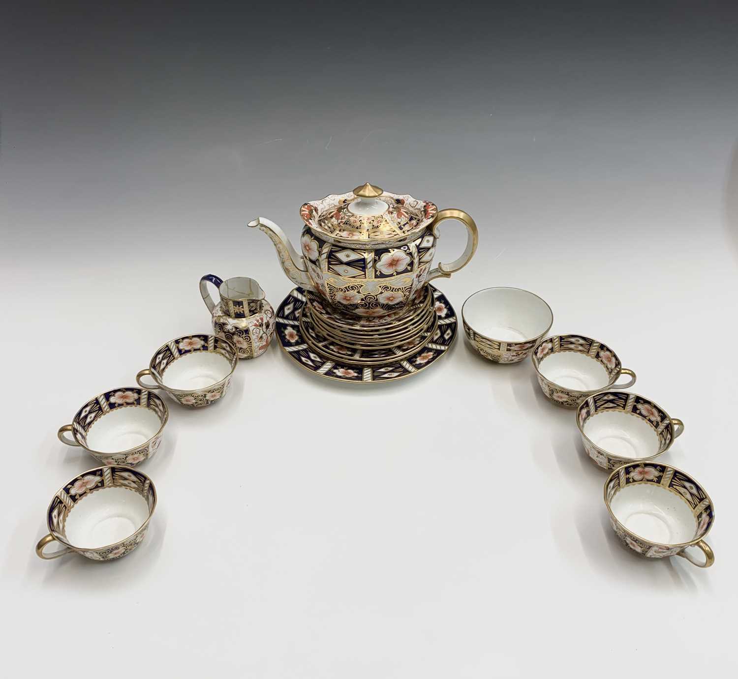 Lot 1011 - A Royal Crown Derby part tea service in the...