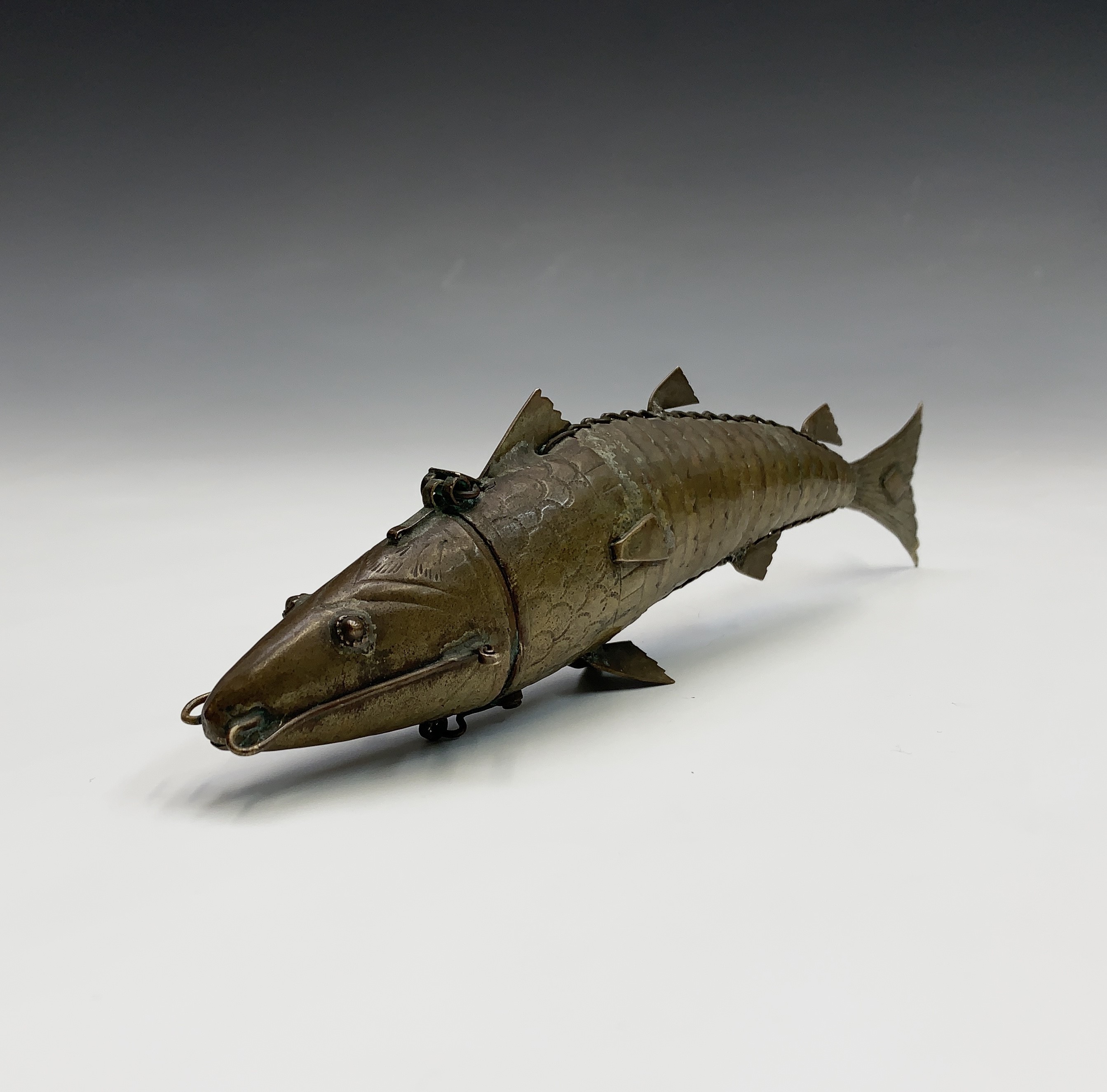 Lot 242 - A Chinese brass articulated fish, circa 1900,