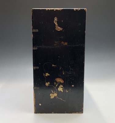 Lot 253 - A Japanese black lacquered table cabinet, 19th...