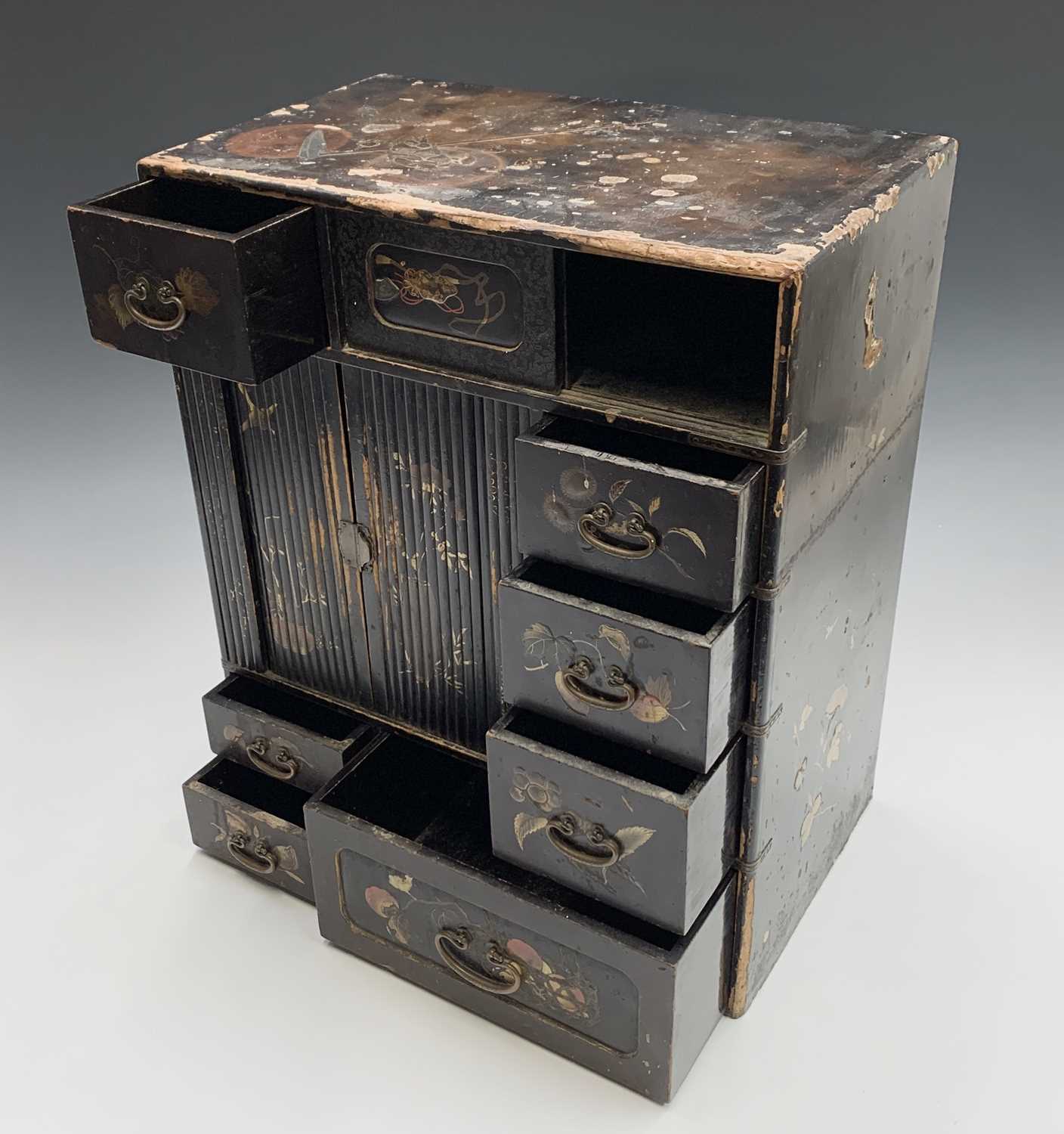 Lot 253 - A Japanese black lacquered table cabinet,