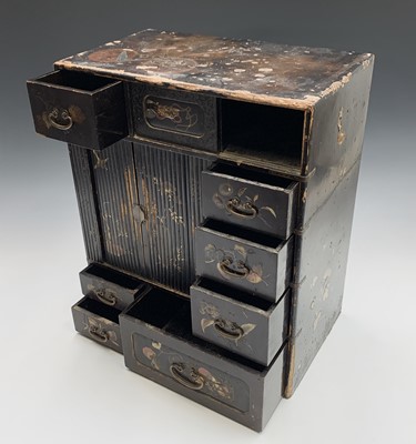 Lot 253 - A Japanese black lacquered table cabinet, 19th...