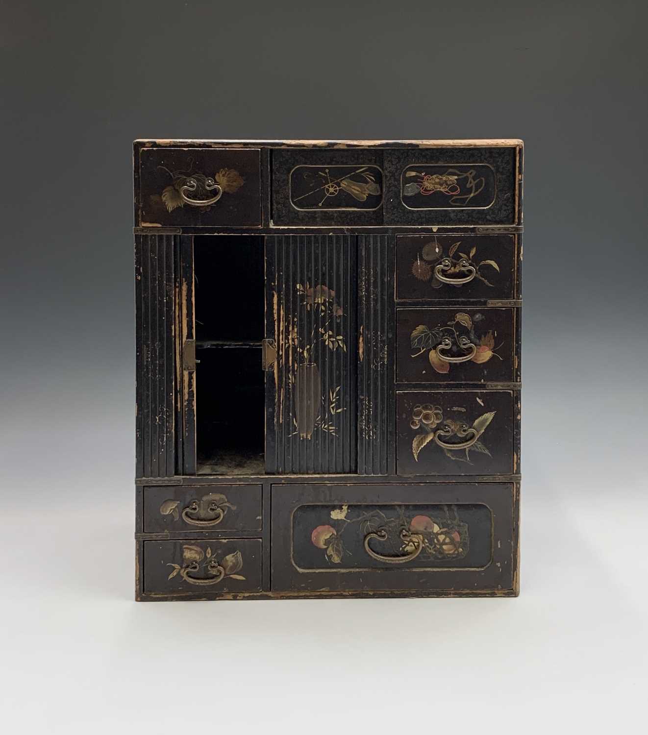 Lot 253 - A Japanese black lacquered table cabinet, 19th...