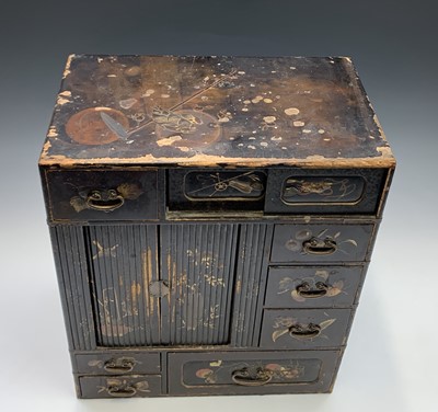 Lot 253 - A Japanese black lacquered table cabinet, 19th...